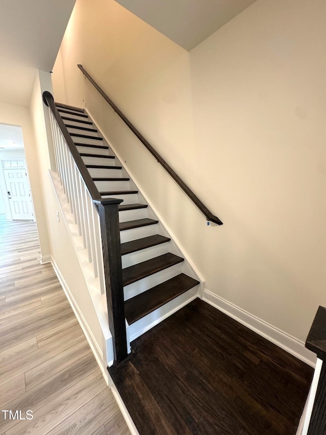 332 Church St Unit 45, Wendell, NC 27591 - staircase featuring wood finished floors and baseboards