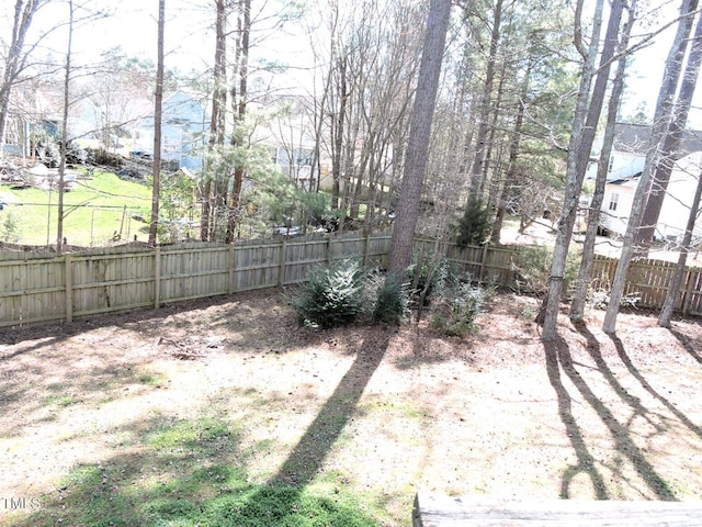 view of yard featuring a fenced backyard