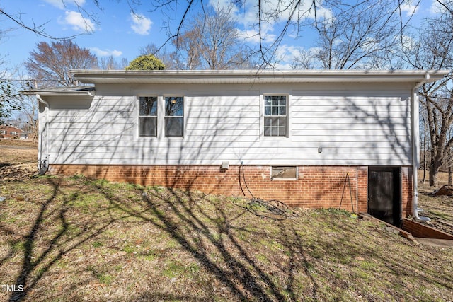 2810 Hickory Hill Rd, Burlington, NC 27215 - view of home's exterior with a lawn