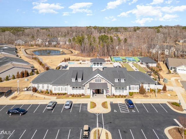 birds eye view of property with a residential view