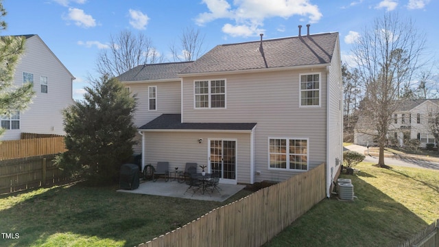 rear view of house featuring a patio area and cooling unit