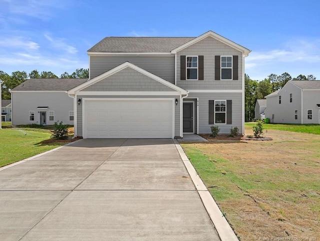 814 Tori Dr, Spring Lake, NC 28390 - view of front of home featuring concrete driveway, an attached garage, and a front yard