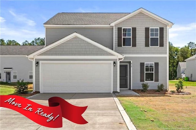 814 Tori Dr, Spring Lake, NC 28390 - view of front facade featuring driveway, an attached garage, and a front yard