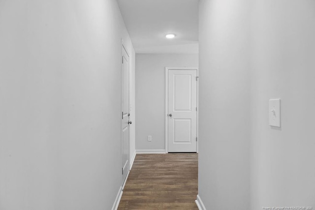 814 Tori Dr, Spring Lake, NC 28390 - hallway featuring dark wood finished floors and baseboards