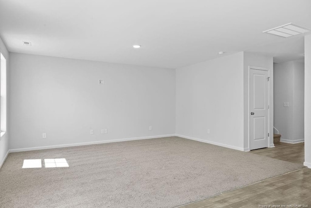 814 Tori Dr, Spring Lake, NC 28390 - empty room with baseboards, carpet flooring, recessed lighting, and wood finished floors