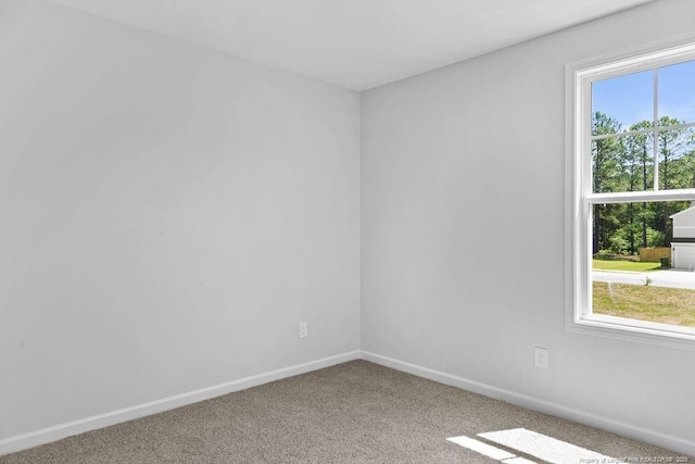 814 Tori Dr, Spring Lake, NC 28390 - carpeted spare room with baseboards