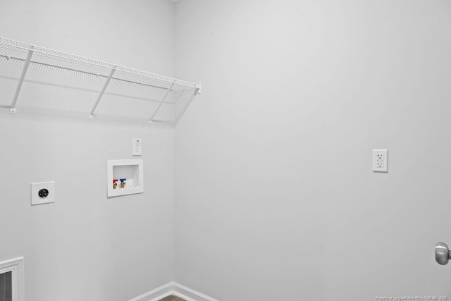 814 Tori Dr, Spring Lake, NC 28390 - laundry room with hookup for an electric dryer, washer hookup, and baseboards