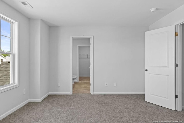 814 Tori Dr, Spring Lake, NC 28390 - carpeted empty room featuring baseboards and a smoke detector