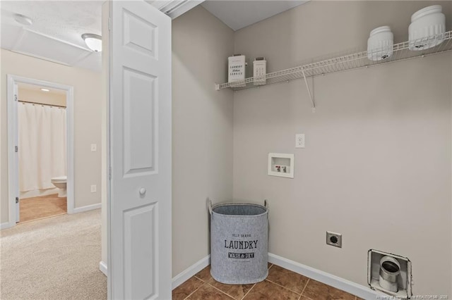 laundry room featuring laundry area, washer hookup, electric dryer hookup, and baseboards