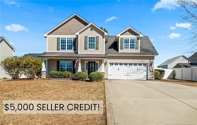 craftsman-style house featuring a front lawn, covered porch, concrete driveway, an attached garage, and fence