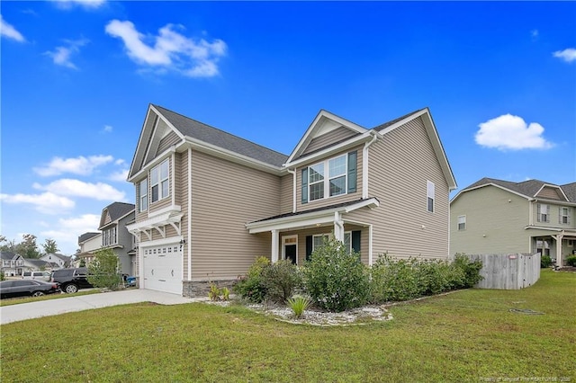 view of front of house featuring driveway, a front lawn, an attached garage, and a residential view