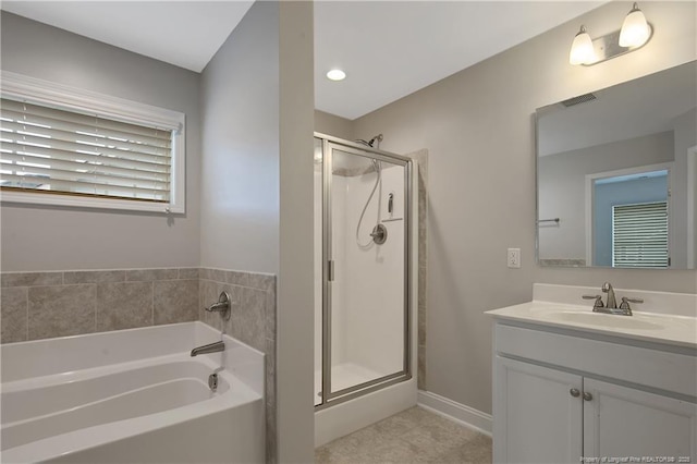 full bath with a garden tub, visible vents, a stall shower, vanity, and baseboards