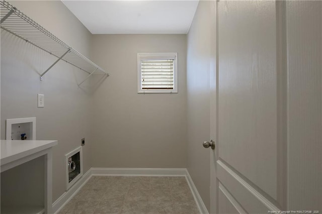 washroom featuring hookup for a washing machine, laundry area, electric dryer hookup, and baseboards