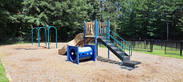 community play area featuring fence