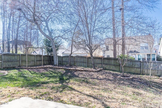 view of yard with a fenced backyard