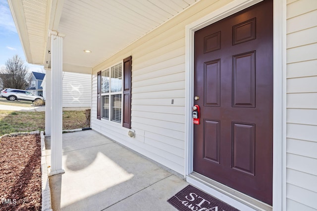 doorway to property with a porch