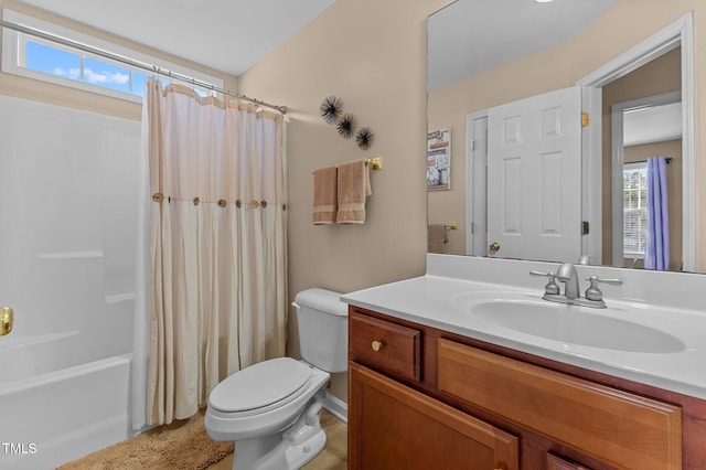 full bathroom with toilet, shower / tub combo with curtain, and vanity