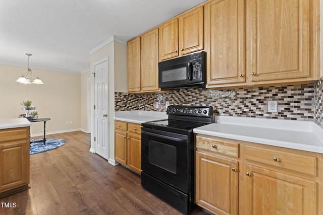 kitchen featuring dark wood-style flooring, crown molding, tasteful backsplash, light countertops, and black appliances