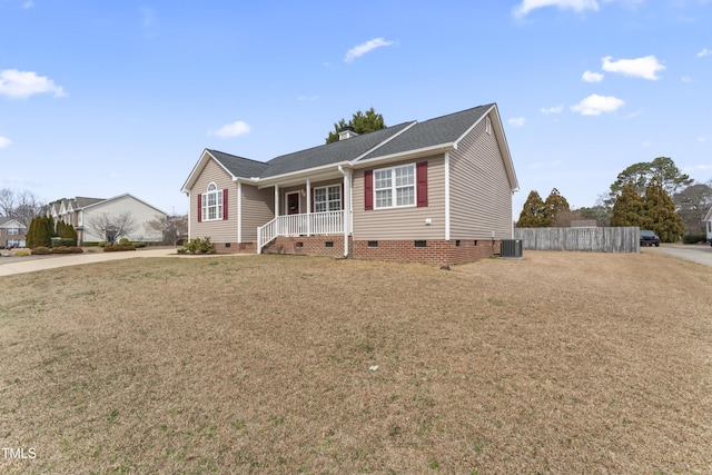 ranch-style home featuring covered porch, central AC unit, a front yard, crawl space, and fence