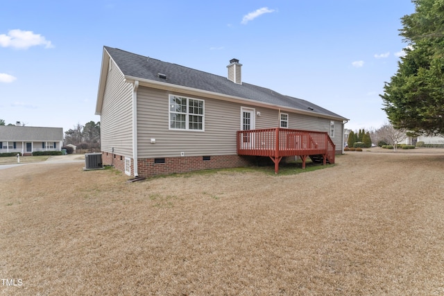 rear view of house with a deck, central AC, a shingled roof, crawl space, and a chimney