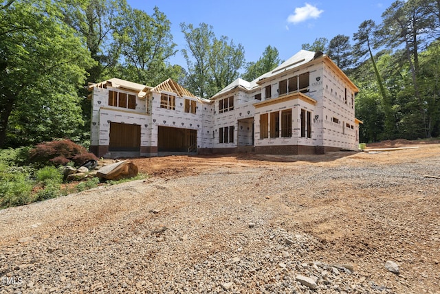 3601 Alamance Dr, Raleigh, NC 27609 - property in mid-construction featuring an attached garage and driveway