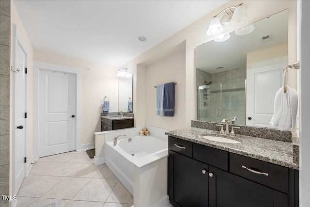 bathroom with a garden tub, tile patterned flooring, a sink, visible vents, and a stall shower