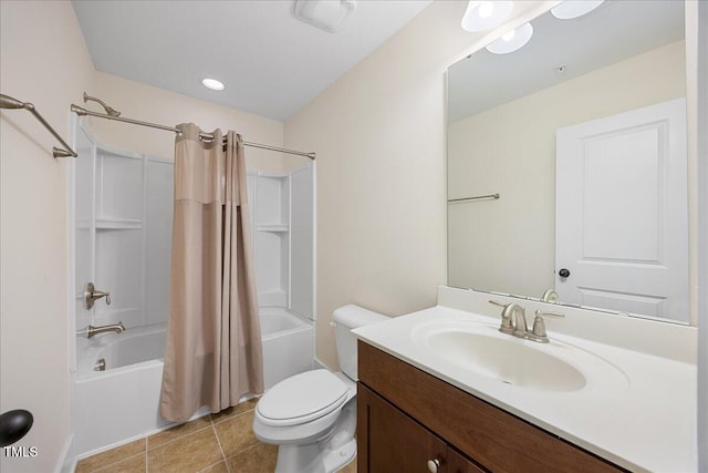 full bathroom with vanity, shower / bath combo with shower curtain, toilet, and tile patterned floors