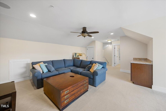 living area featuring baseboards, a ceiling fan, light colored carpet, lofted ceiling, and recessed lighting