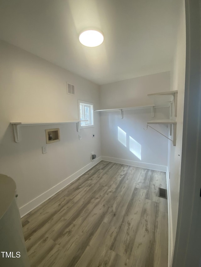 washroom with laundry area, washer hookup, visible vents, and hookup for an electric dryer