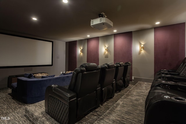 cinema room featuring recessed lighting, dark colored carpet, and baseboards