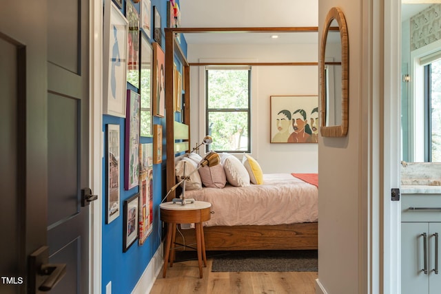 bedroom featuring light wood-type flooring