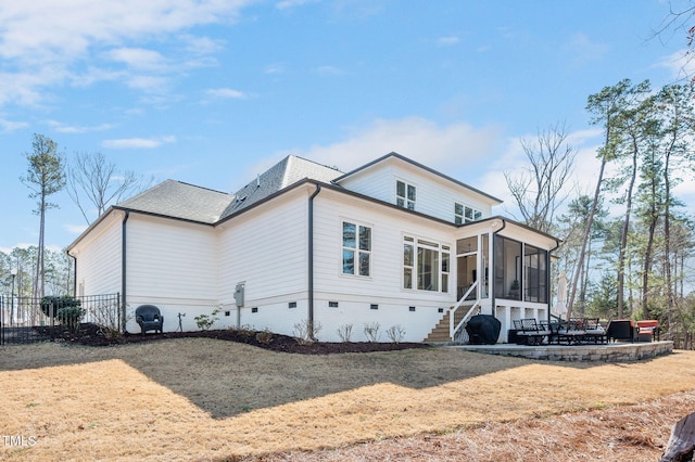 exterior space featuring crawl space and a sunroom