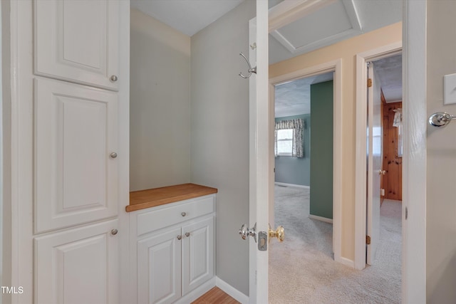6605 Pearces Rd, Louisburg, NC 27549 - corridor featuring light colored carpet and baseboards
