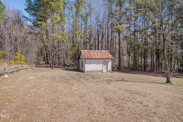 6605 Pearces Rd, Louisburg, NC 27549 - view of yard with a storage shed and an outdoor structure