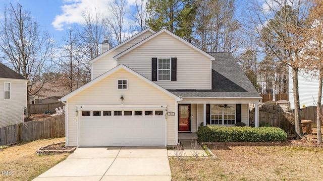 traditional home with a chimney, fence, concrete driveway, and roof with shingles