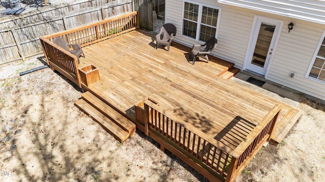 wooden deck featuring fence