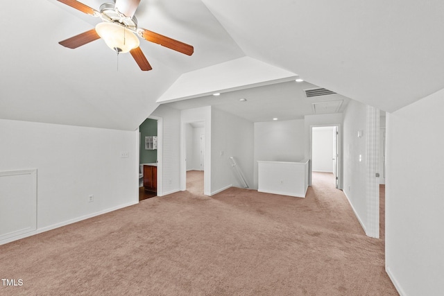 bonus room with carpet flooring, visible vents, baseboards, vaulted ceiling, and attic access