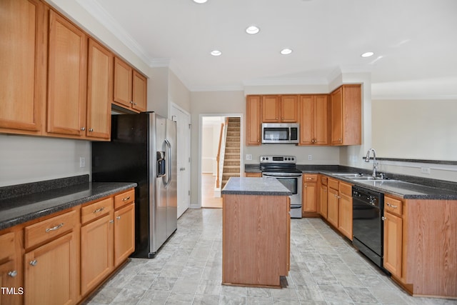 kitchen with recessed lighting, a sink, appliances with stainless steel finishes, a center island, and crown molding