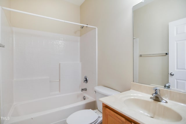 bathroom featuring toilet, shower / bath combination, and vanity