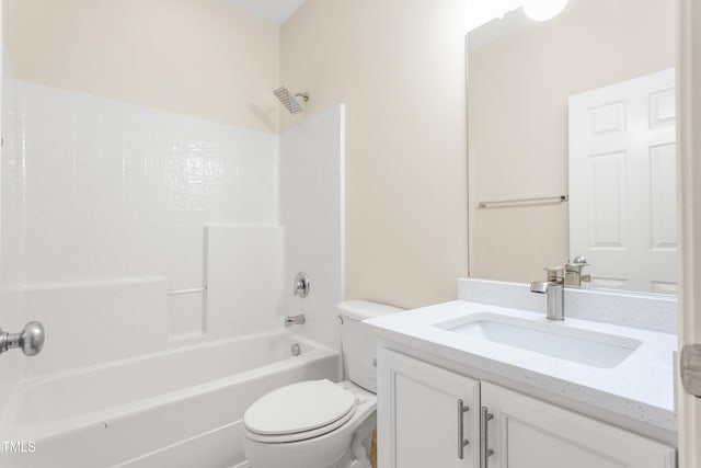 full bath with toilet, vanity, and shower / bathtub combination