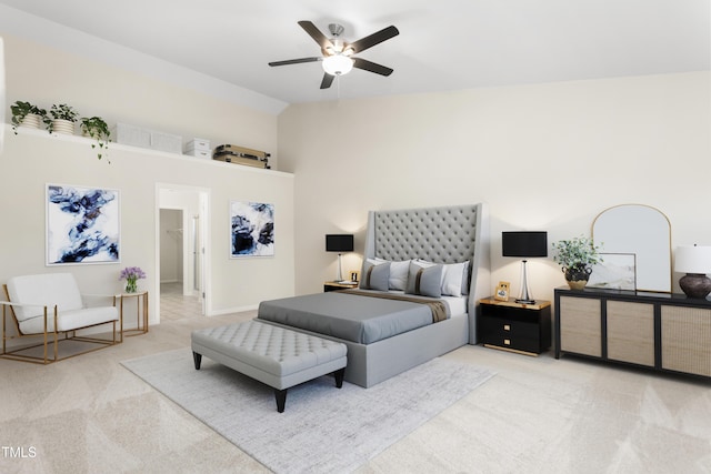 bedroom with carpet floors, lofted ceiling, and ceiling fan