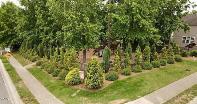 surrounding community with a lawn