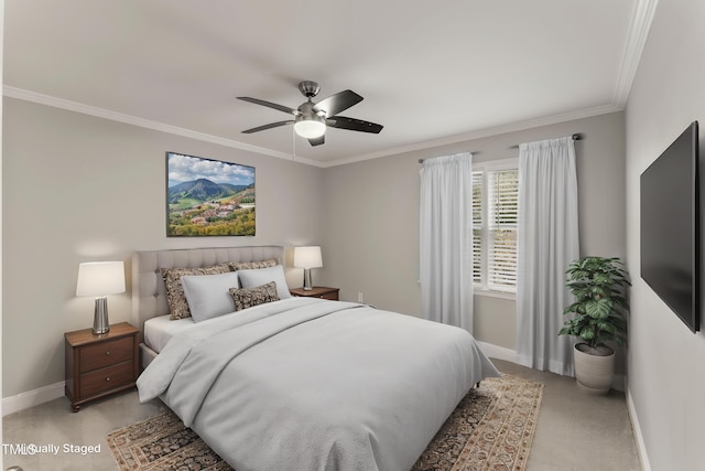 bedroom with crown molding, light carpet, baseboards, and a ceiling fan