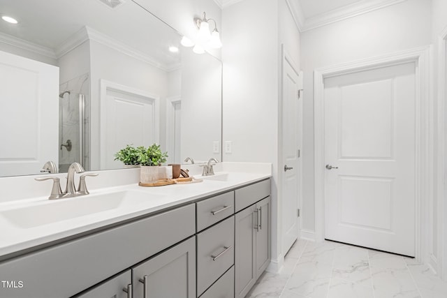 full bath with marble finish floor, a stall shower, a sink, and crown molding