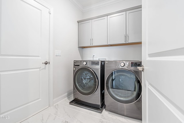 laundry room featuring separate washer and dryer, baseboards, marble finish floor, ornamental molding, and cabinet space