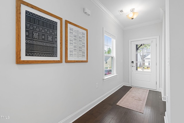 entryway featuring ornamental molding, dark wood finished floors, visible vents, and baseboards