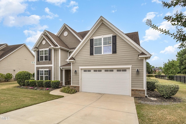 traditional-style house featuring brick siding, concrete driveway, an attached garage, fence, and a front lawn