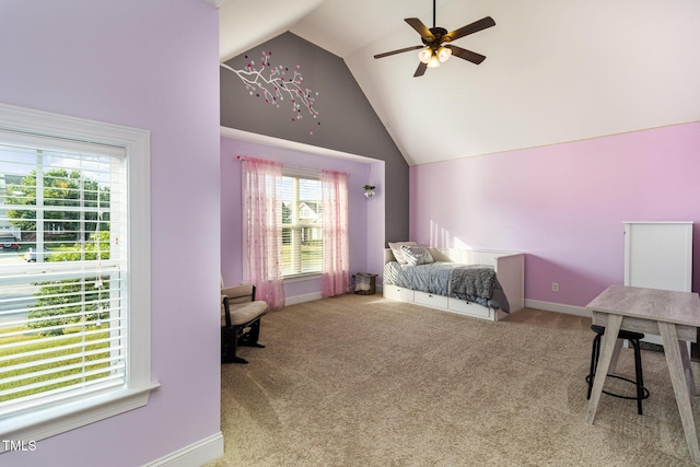 carpeted bedroom with ceiling fan, high vaulted ceiling, and baseboards