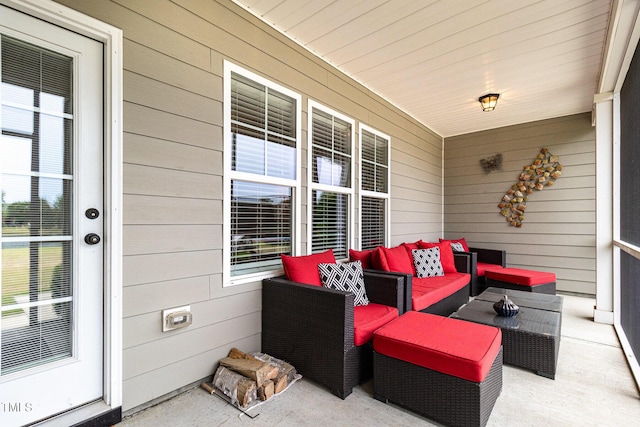 view of patio / terrace with a porch and outdoor lounge area