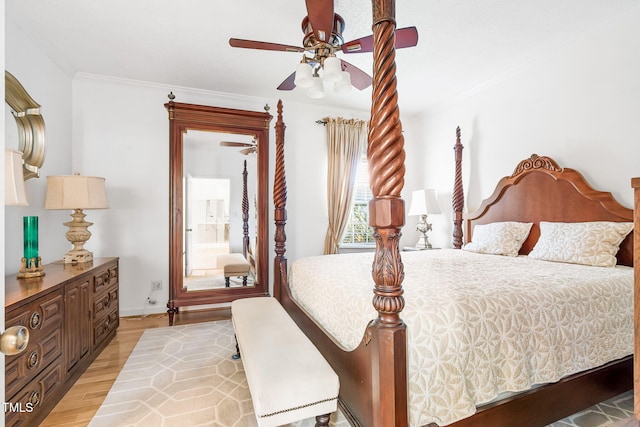 bedroom featuring light wood-style floors, baseboards, a ceiling fan, and crown molding